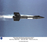The X-15 #2 (56-6671) launches away from the B-52 mothership with its rocket engine ignited. The white patches near the middle of the ship are frost from the liquid oxygen used in the propulsion system, although very cold liquid nitrogen was also used to cool the payload bay, cockpit, windshields, and nose.